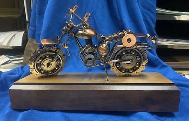MOTORCYCLE — MODEL MOUNTED — WOOD BASE — MOTORCYCLE PROVIDED — BY CUSTOMER